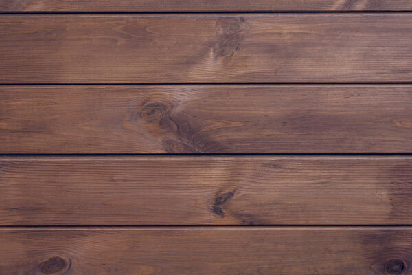 Brown wooden background of horizontal planks