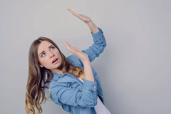 Black friday hot big price prohibition shopper shopaholic look up retail customer person throw pressure press reject symbol incline concept. Pretty girl shielding herself isolated on gray background