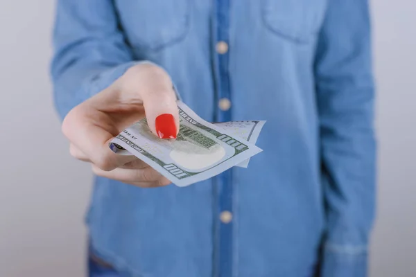 Us usa people person bonus reward prize extra job work premium bundle income earnings investment loan new gift concept. Cropped close up photo of lady giving holding cash in hand isolated background