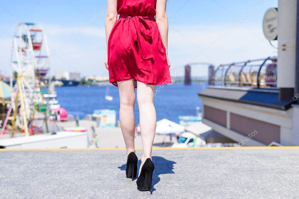 Color shine bright getaway amusement part resort luxury chic wear attitude style stylish glamour concept. Rear back behind close up view photo portrait of beautiful fit lady's legs black suede shoes