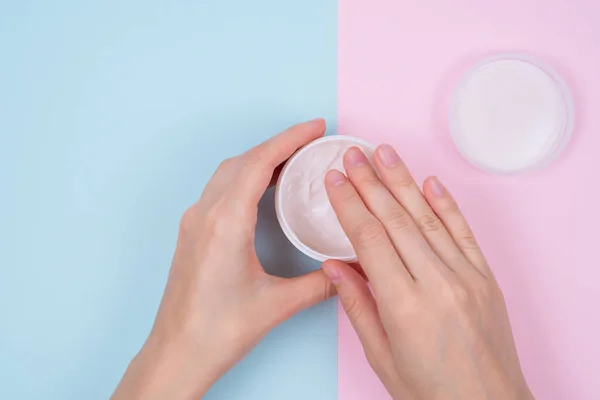 Clean clear finger natural nourishing fingernail concept. Above top overhead high angle flatlay flat lay close up view photo of beautiful flawless hands open unpack unwrap isolated pastel background