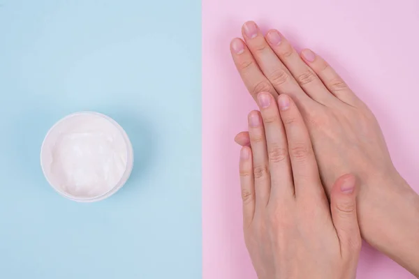Clean clear finger natural nourishing fingernail concept. Above top overhead high angle flatlay flat lay close up view photo of beautiful flawless aromatic hands isolated pastel background