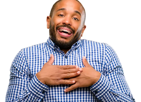 No thanks, I refuse. Portrait of displeased intense attractive  african-american man with beard and moustache, pulling palms towards camera  in stop or rejection gesture, expressing dislike and disgust Stock Photo