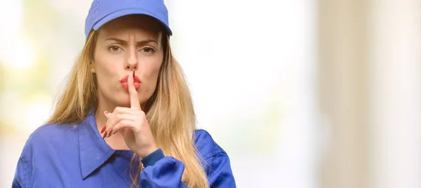 Young Plumber Woman Index Finger Lips Ask Quiet Silence Secret — Stock Photo, Image