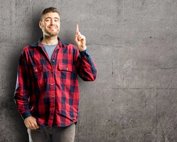 Joven Hombre Guapo Levantando Dedo Número Uno — Foto de Stock