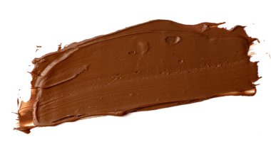 Çikolata beyaz arka planda izole bir şekilde yayılmış. Lezzetli yemek tasarımı