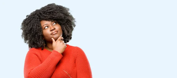 Beautiful African Woman Thinking Looking Expressing Doubt Wonder Blue Background — Stock Photo, Image