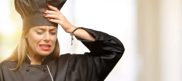 Young cook woman doubt expression, confuse and wonder concept, uncertain future