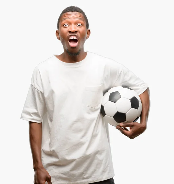 African Black Man Holding Soccer Ball Stressful Terrified Panic Shouting — Stock Photo, Image