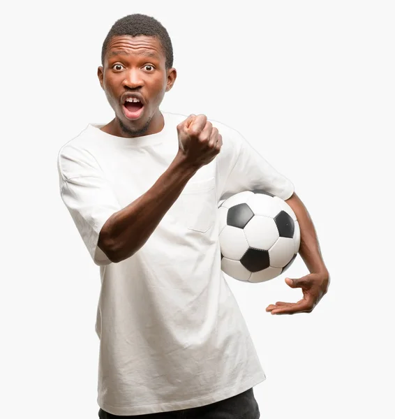 African Black Man Holding Soccer Ball Irritated Angry Expressing Negative — Stock Photo, Image
