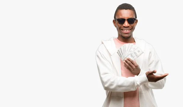 African Man Holding Dollar Bank Notes Holding Something Empty Hand — Stock Photo, Image