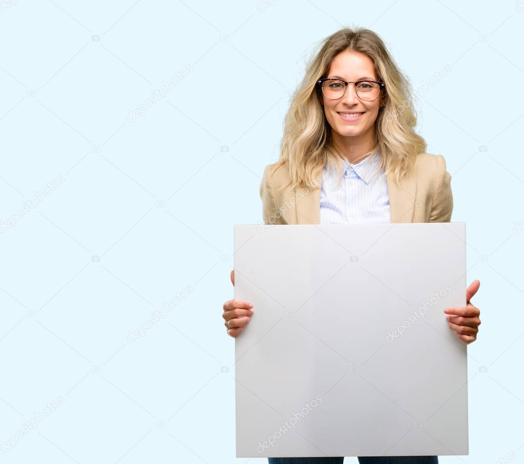 Young beautiful woman holding blank advertising banner, good poster for ad, offer or announcement, big paper billboard