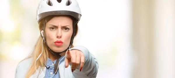 Young Woman Bike Helmet Earphones Pointing Front Finger — Stock Photo, Image