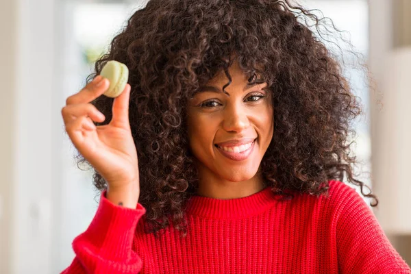 African American Woman Holding Macaron Happy Face Standing Smiling Confident — Stock Photo, Image