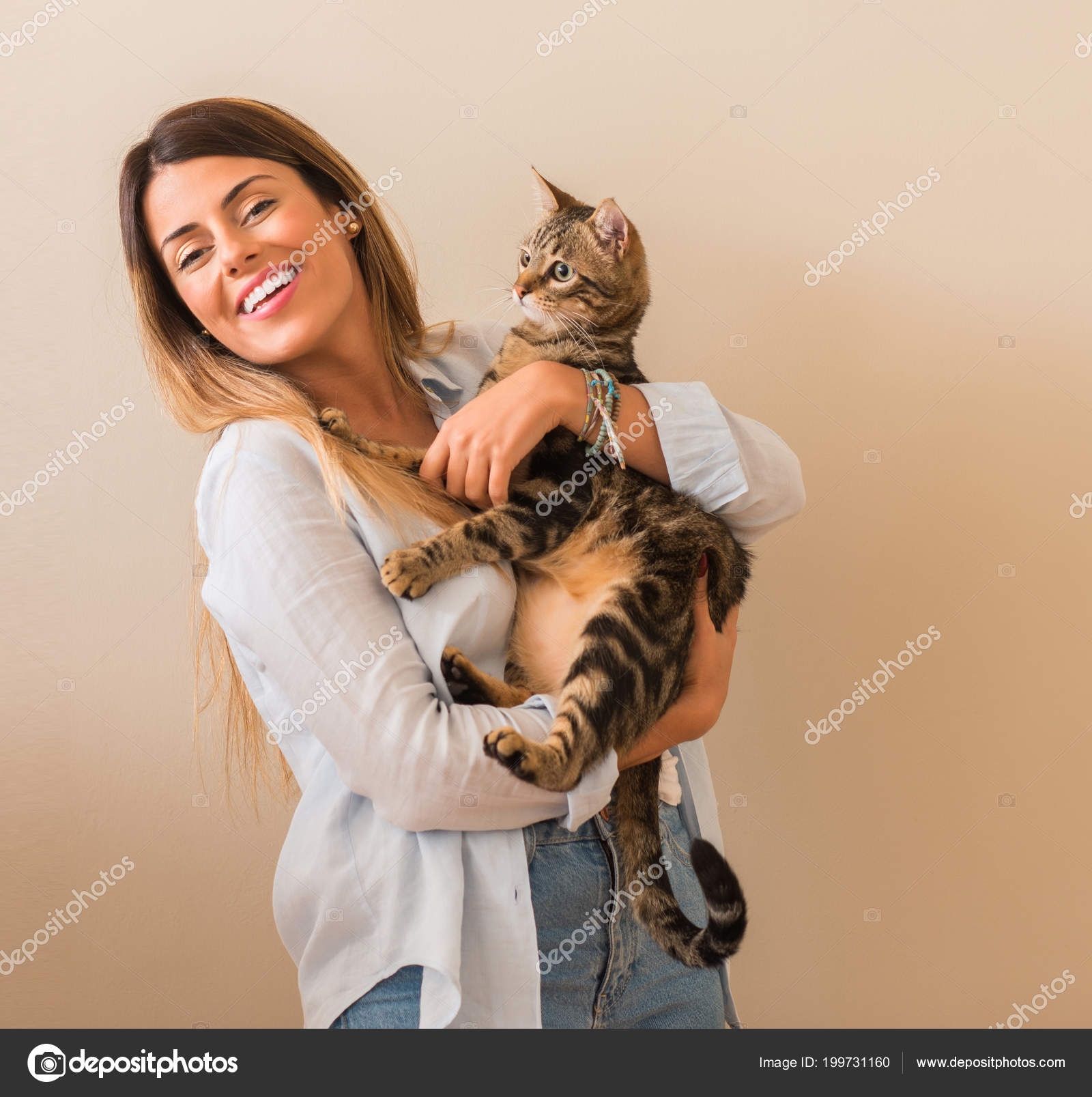 Young Beautiful Woman Smiling Cuddling Cat Love Home Stock Photo By C Krakenimages Com 199731160