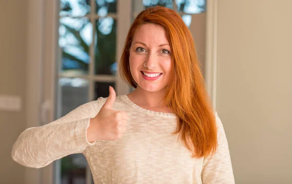 Redhead Woman Home Happy Big Smile Doing Sign Thumb Fingers — Stock Photo, Image