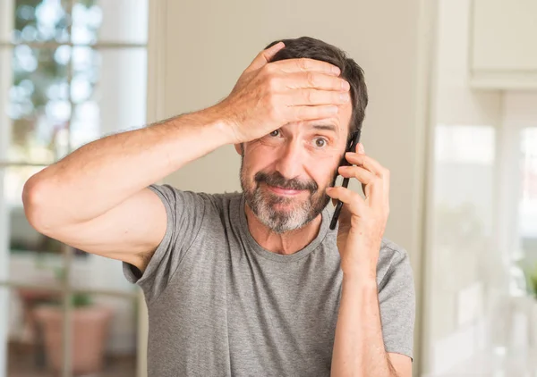 Middle Age Man Using Smartphone Stressed Hand Head Shocked Shame — Stock Photo, Image