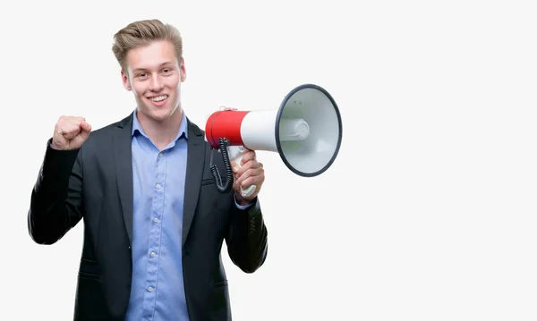 Young Handsome Blond Man Holding Megaphone Screaming Proud Celebrating Victory — Stock Photo, Image