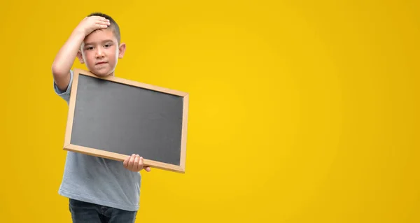 Dark Haired Little Child Holding Blackboard Stressed Hand Head Shocked — Stock Photo, Image