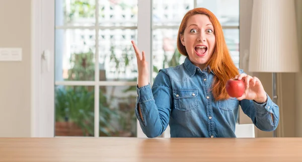 Redhead Woman Holding Red Apple Home Very Happy Excited Winner — Stock Photo, Image