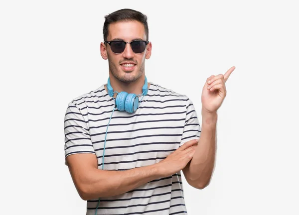 Handsome Young Man Wearing Headphones Big Smile Face Pointing Hand — Stock Photo, Image