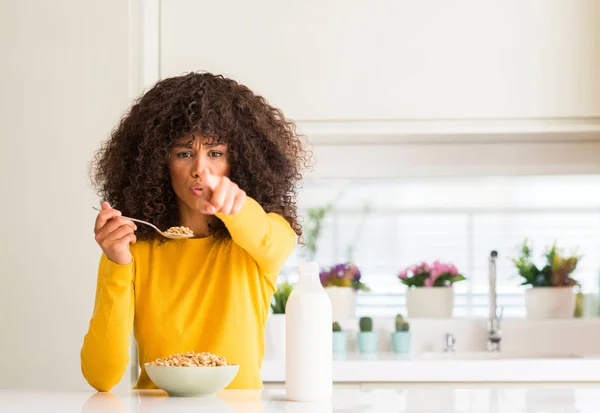 African American Woman Eating Cereals Milk Home Pointing Finger Camera — Stock Photo, Image
