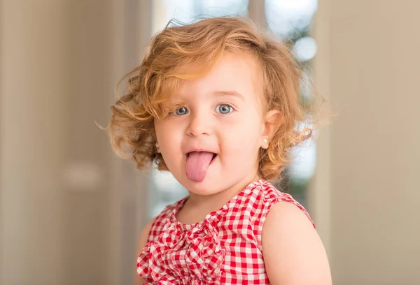 Beautiful Blonde Child Blue Eyes Smiling Tongue Out Home — Stock Photo, Image