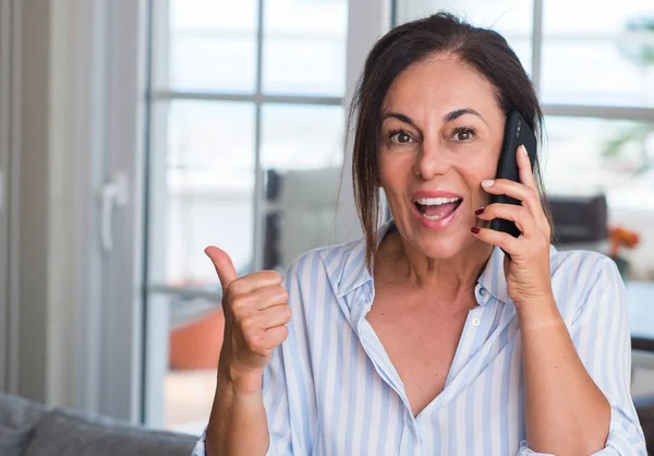 Middle Aged Woman Using Smartphone Pointing Hand Finger Happy Face — Stock Photo, Image