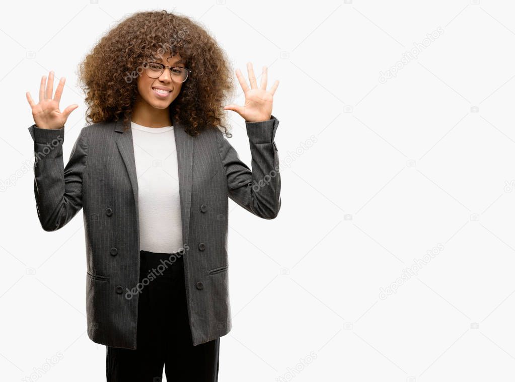 African american business woman wearing glasses showing and pointing up with fingers number ten while smiling confident and happy.