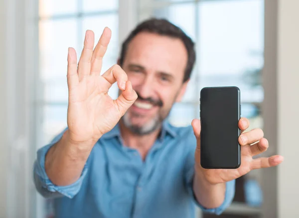 Middle Age Man Using Smartphone Doing Sign Fingers Excellent Symbol — Stock Photo, Image
