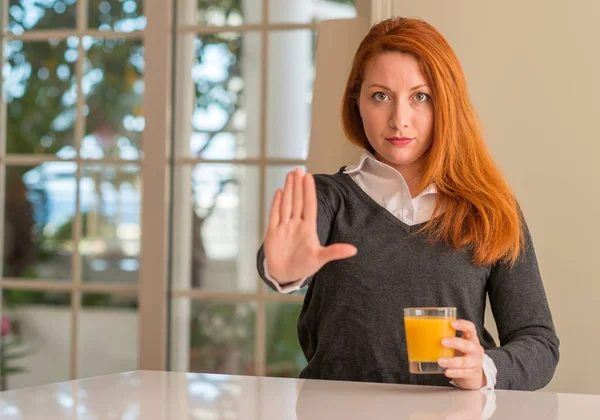 Redhead Woman Holding Orange Juice Glass Home Open Hand Doing — Stock Photo, Image