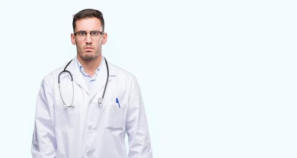 Handsome Young Doctor Man Skeptic Nervous Frowning Upset Because Problem — Stock Photo, Image