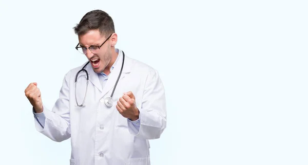 Handsome Young Doctor Man Very Happy Excited Doing Winner Gesture — Stock Photo, Image