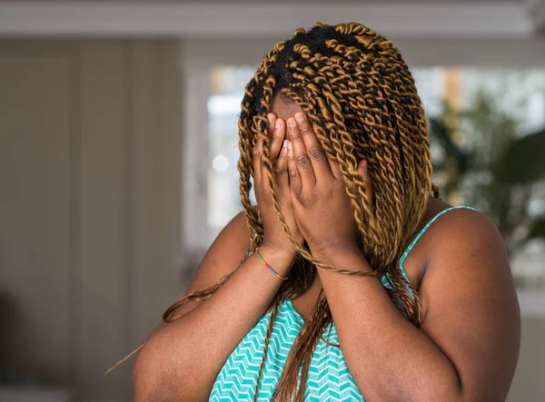 African American Woman Home Sad Expression Covering Face Hands While — Stock Photo, Image