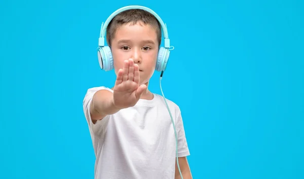 Dark Haired Little Child Listening Music Headphones Open Hand Doing — Stock Photo, Image