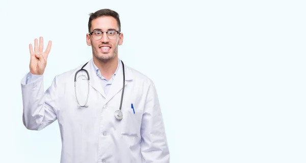 Guapo Joven Doctor Hombre Mostrando Señalando Hacia Arriba Con Los — Foto de Stock