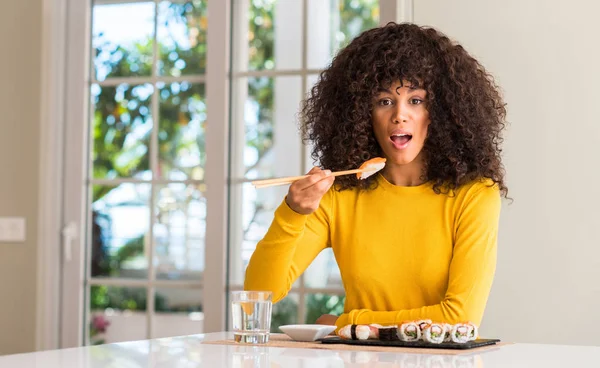 African American Woman Eating Sushi Using Chopsticks Home Scared Shock — Stock Photo, Image