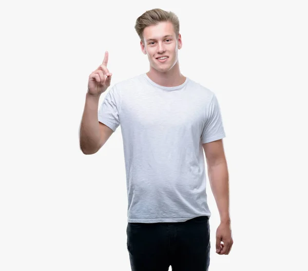 Young Handsome Blond Man Surprised Idea Question Pointing Finger Happy — Stock Photo, Image