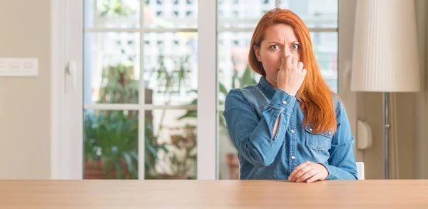 Redhead Woman Home Smelling Something Stinky Disgusting Intolerable Smell Holding — Stock Photo, Image