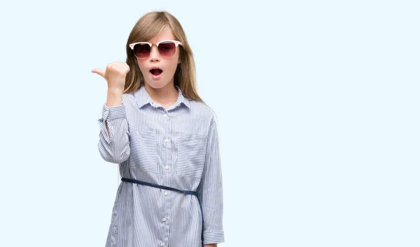 Young Blonde Toddler Wearing Blue Shirt Pointing Hand Finger Happy — Stock Photo, Image