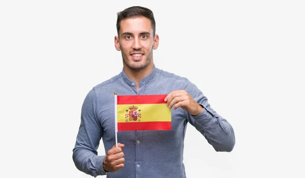 Joven Guapo Sosteniendo Una Bandera España Con Una Cara Feliz — Foto de Stock