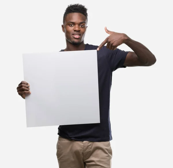 Young African American Man Holding Banner Very Happy Pointing Hand — Stock Photo, Image