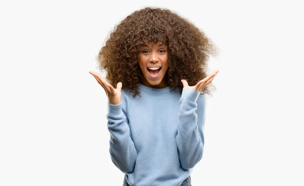 African American Woman Wearing Sweater Celebrating Crazy Amazed Success Arms — Stock Photo, Image