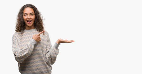 Beautiful Young Hispanic Woman Wearing Stripes Sweater Amazed Smiling Camera — Stock Photo, Image