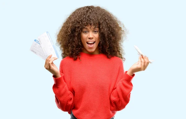 African American Woman Holding Airline Boarding Pass Tickets Scared Shock — Stock Photo, Image