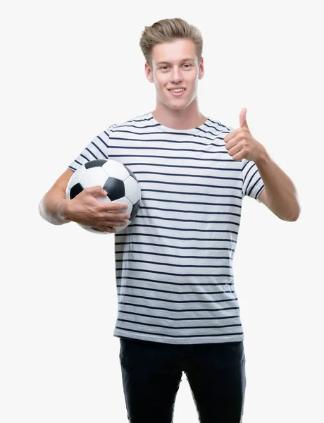 Joven Hombre Guapo Rubio Sosteniendo Pelota Fútbol Feliz Con Una — Foto de Stock