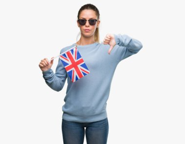 Kızgın yüz, eksi işareti aşağı antipati başparmak ile gösterilen, ret kavramı ile İngiltere'de bayrak tutan güzel genç kadın
