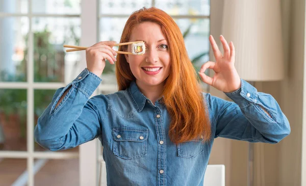 Redhead Woman Eating Sushi Using Chopsticks Doing Sign Fingers Excellent — Stock Photo, Image