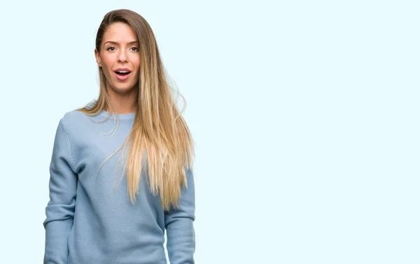 Beautiful Young Woman Wearing Sweater Jeans Scared Shock Surprise Face — Stock Photo, Image