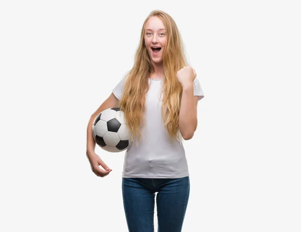 Blonde Teenager Woman Holding Soccer Football Ball Screaming Proud Celebrating — Stock Photo, Image
